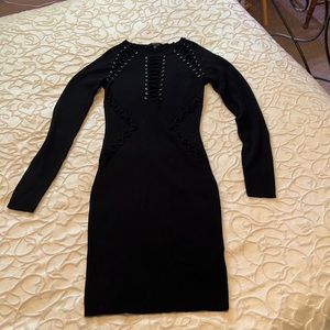 Guess knitted dress with beautiful detail at chest and waist. Holiday party